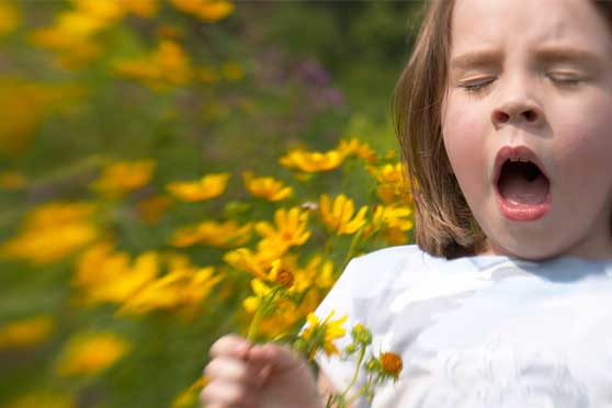 girl sneezing