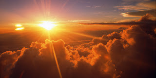 Sunrise over Clouds with Blue Sky